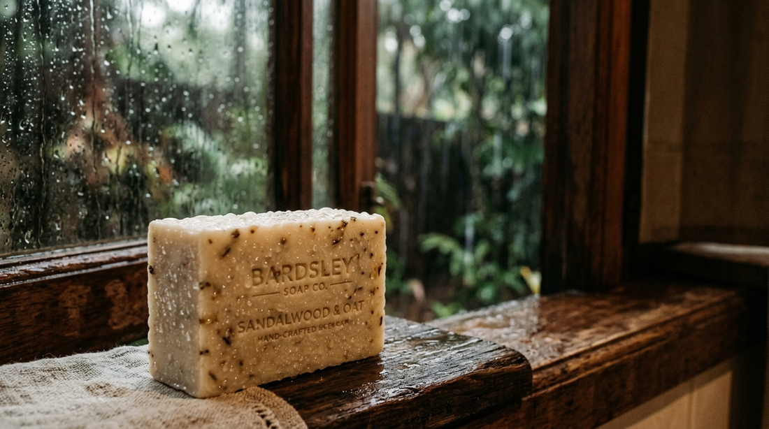 Soap bar covered in fine beads of moisture with monsoon rain visible through a window